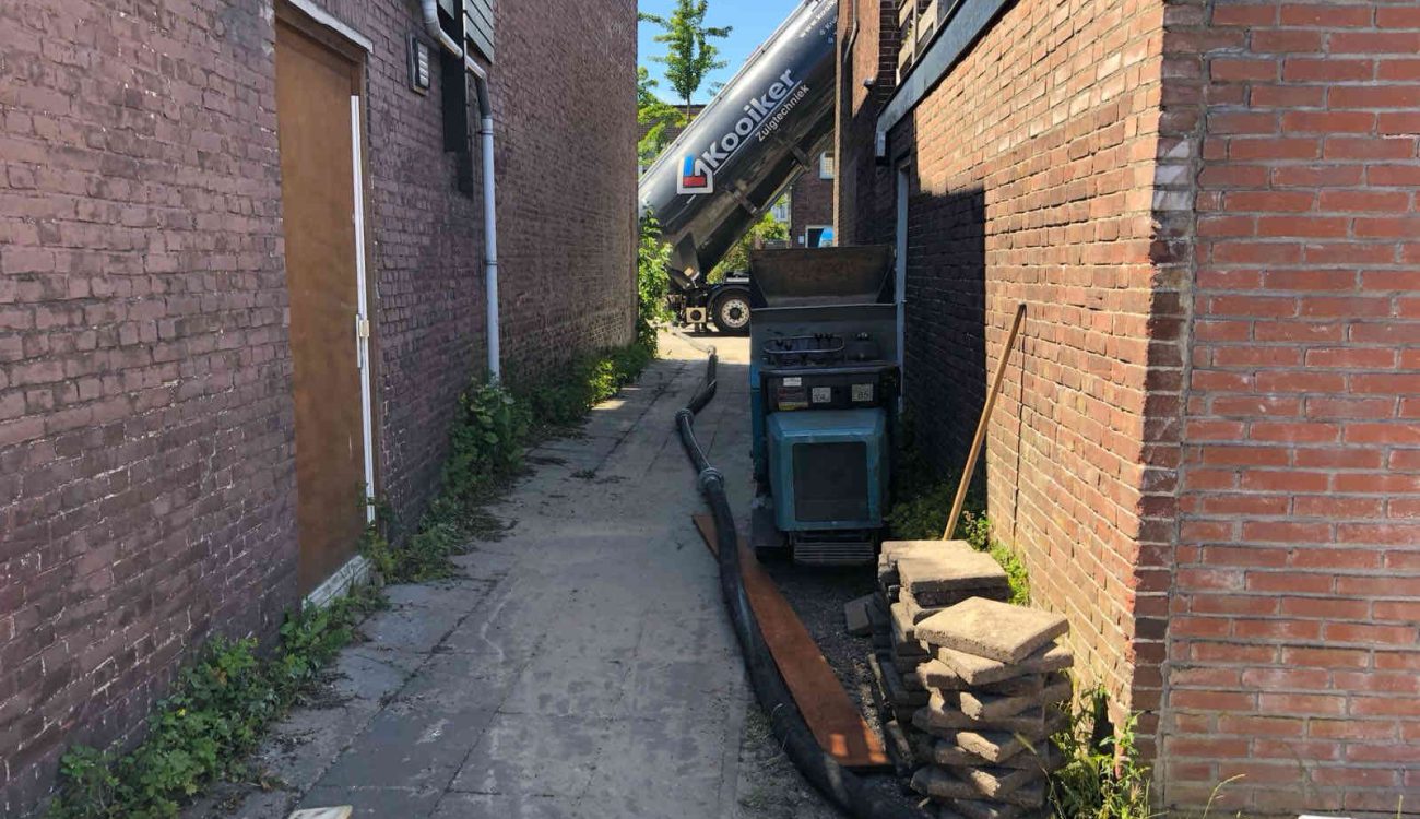 Ophogen tuin met zandblazen Haarlem