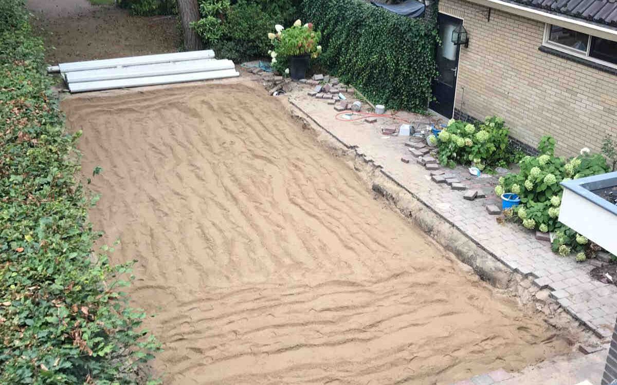 Dempen zwembad met zand